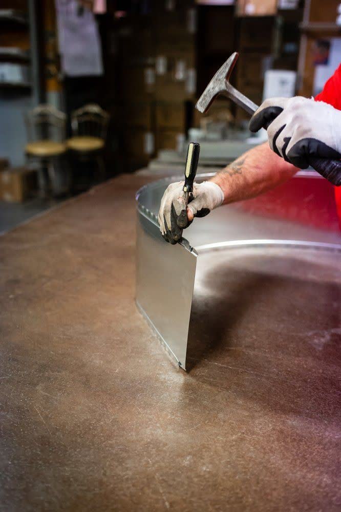 Hand-seaming a custom duct fitting